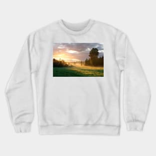 Foggy grassland and trees at sunrise Crewneck Sweatshirt